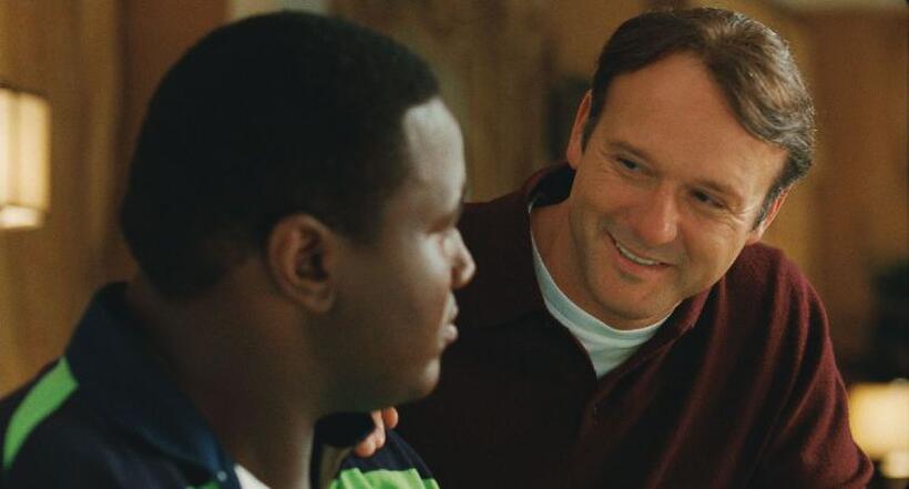 Quinton Aaron as Michael Oher and Tim McGraw as Sean Tuohy in "The Blind Side."