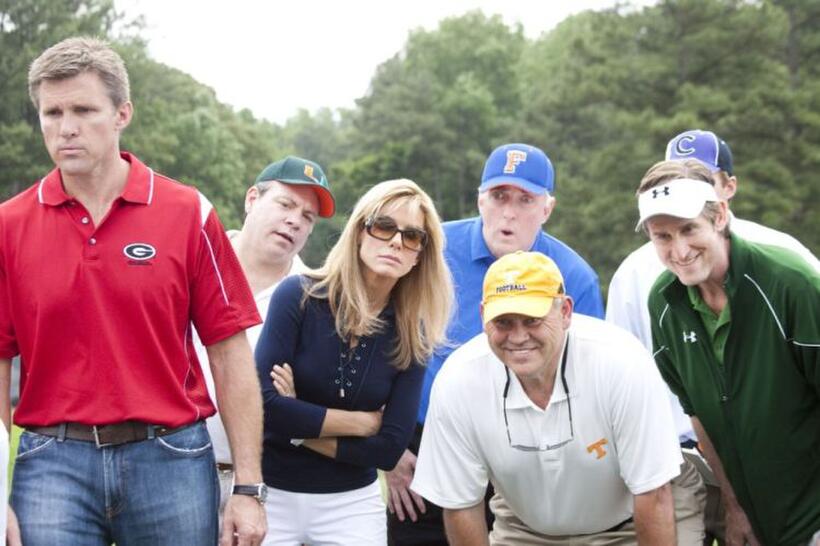 Sandra Bullock as Leigh Anne Tuohy, Phillip Fulmer as Himself and Ray McKinnon as Coach Cotton in "The Blind Side."
