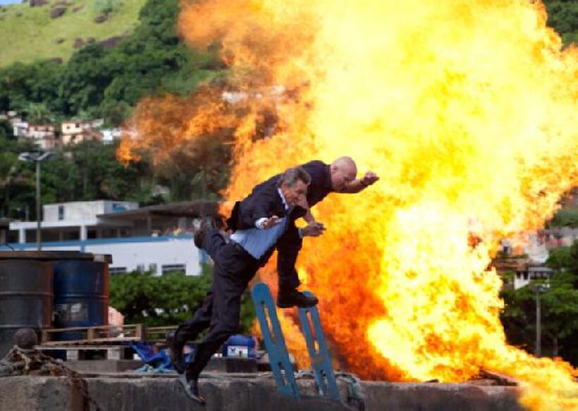 Eric Roberts and Stone Cold Steve Austin in "The Expendables."