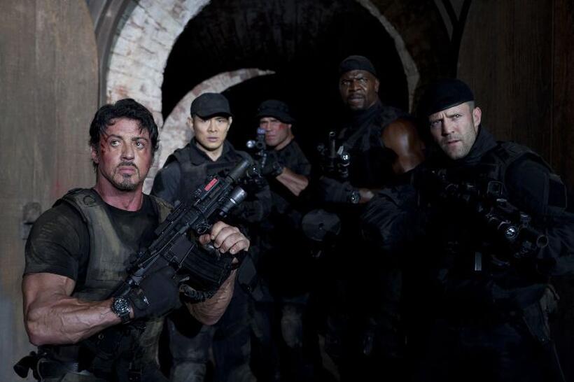 Sylvester Stallone as Barney Ross, Jet Li as Yin Yang, Randy Couture as Toll Road, Terry Crews as Hale Caesar and Jason Statham as Lee Christmas in "The Expendables."