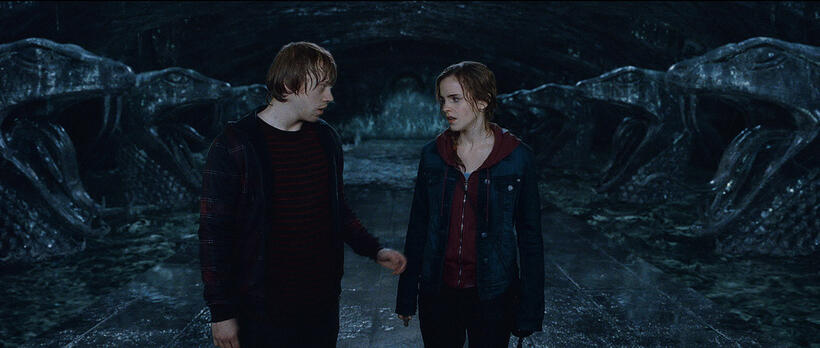 Rupert Grint as Ron Weasley and  Emma Watson as Hermione Granger in "Harry Potter and The Deathly Hallows: Part 2."