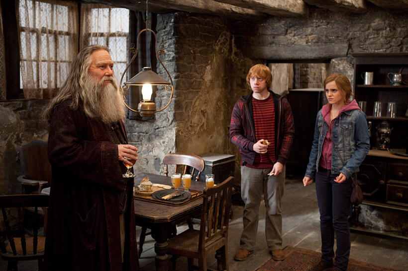 Ciaran Hinds as Aberforth Dumbledore, Rupert Grint as Ron Weasley and Emma Watson as Hermione Granger in "Harry Potter and The Deathly Hallows: Part 2."