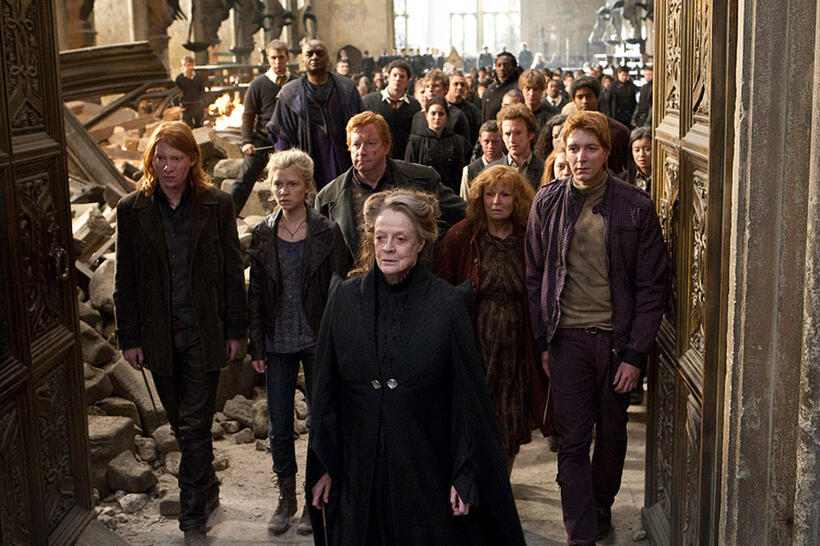 Domhnall Gleeson as Bill Weasley, Clemence Poesy as Fleur Delacour, Mark Williams as Arthur Weasley, Maggie Smith as Professor Minerva Mcgonagall, Julie Walters as Molly Weasley and Oliver Phelps as George Weasley in "Harry Potter and The Deathly Hallows: Part 2."