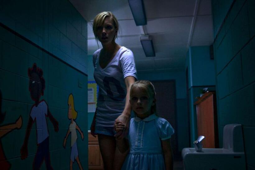 Katie Cassidy as Kris Fowles and Julianna Damm as Little Kris in "A Nightmare on Elm Street."
