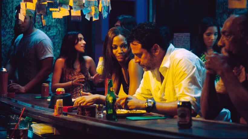Zoe Saldana as Aisha and Jeffrey Dean Morgan as Clay in "The Losers."