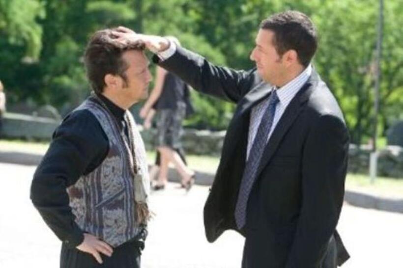 Rob Schneider as Rob Hilliard and Adam Sandler as Lenny Feder in "Grown Ups."