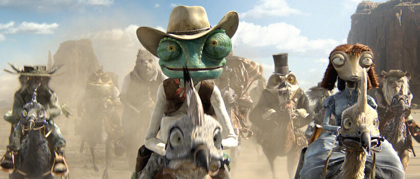 Rango voiced by Johnny Depp and Beans voiced by Isla Fisher in "Rango."