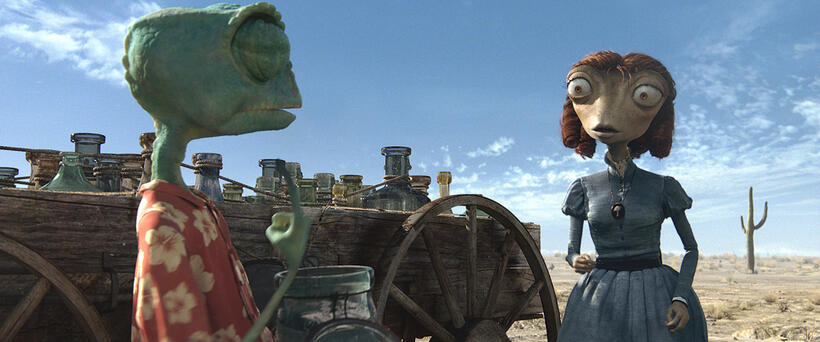 Rango voiced by Johnny Depp and Beans voiced by Isla Fisher in "Rango."