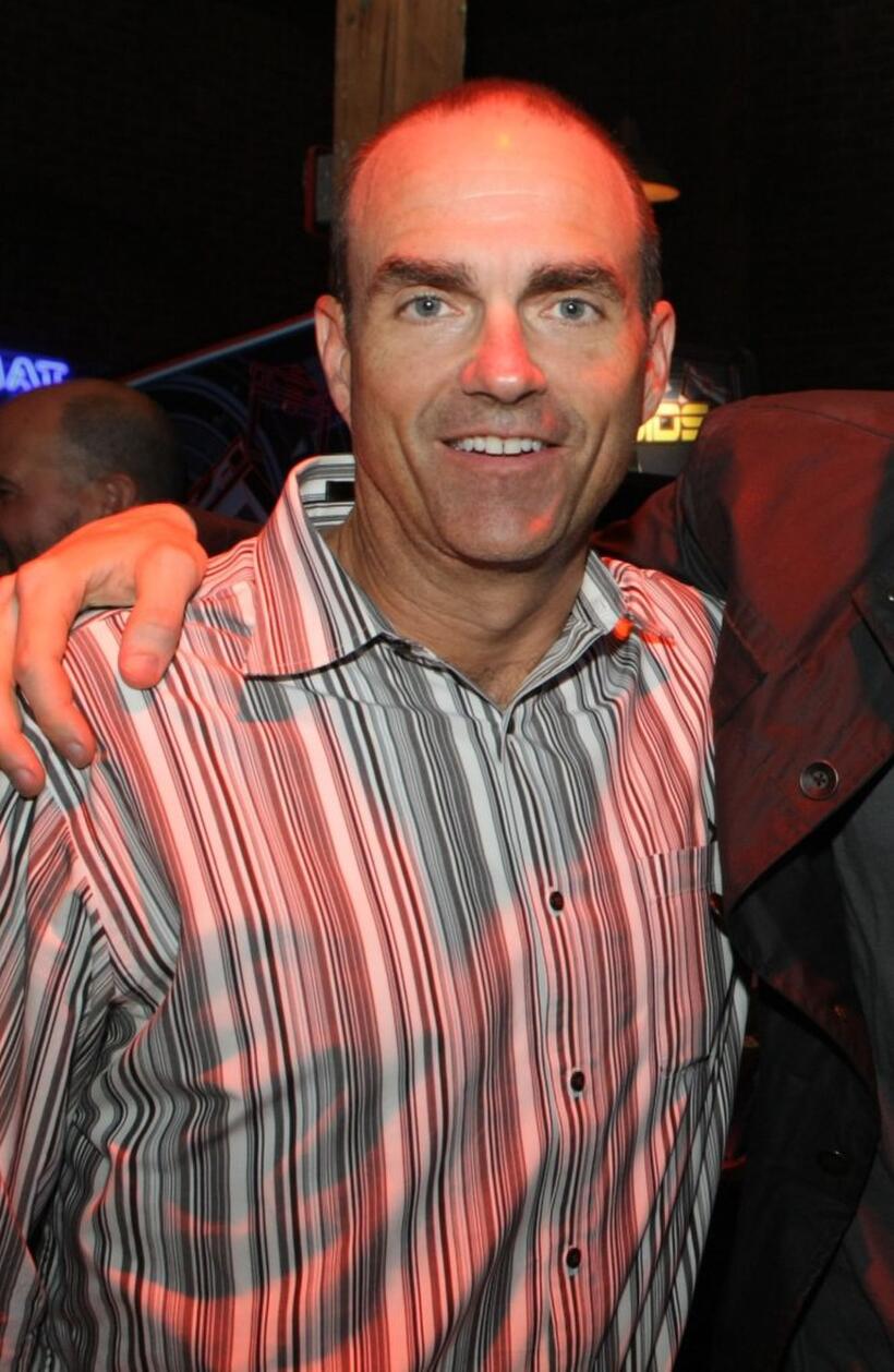 Mark Zoradi at the Tron Legacy Flynn's Arcade.