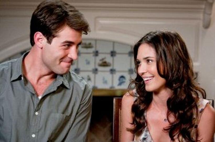 James Wolk and Odette Yustman in "You Again."