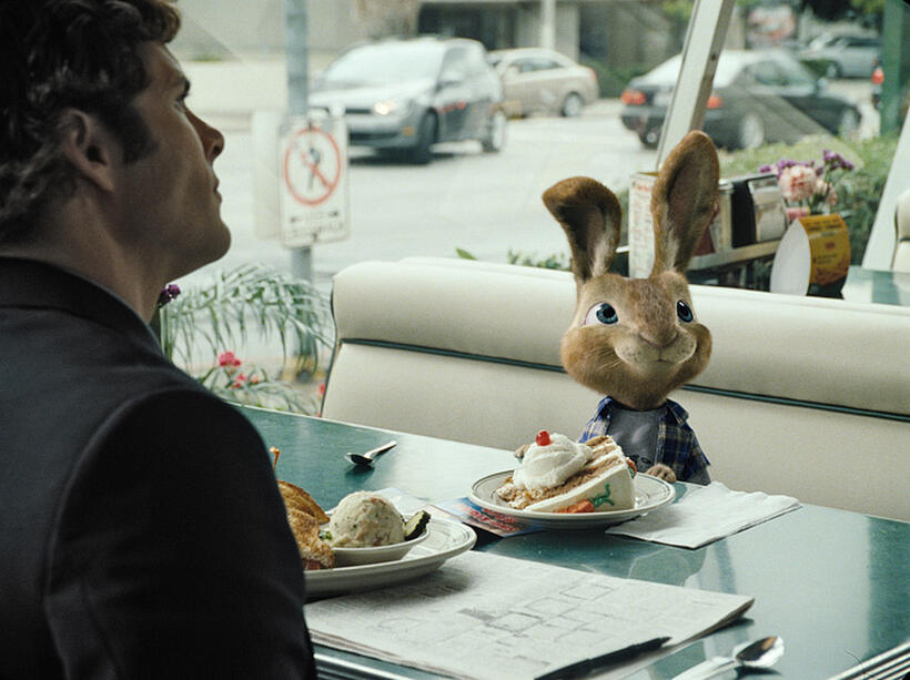 James Marsden as Fred and E.B. voiced by Russell Brand in "Hop."