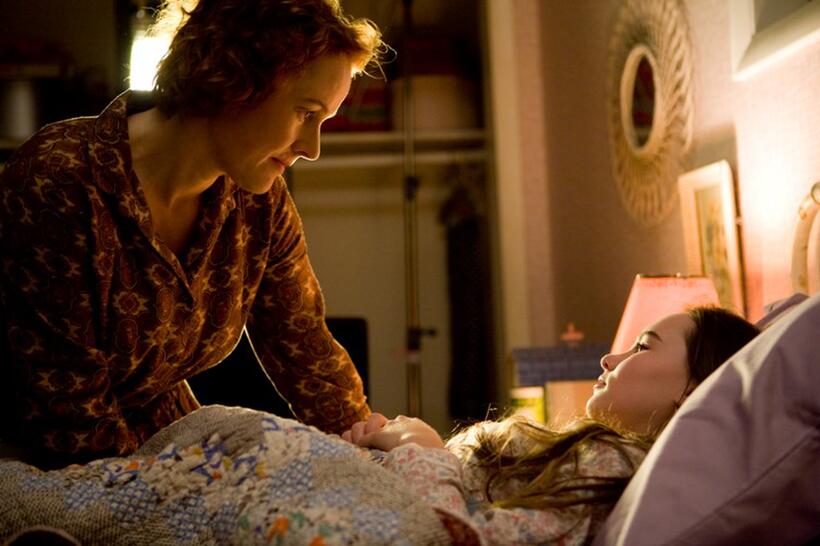 Penelope Ann Miller as Trina Baker and Madeline Carroll as Juli Baker in "Flipped."