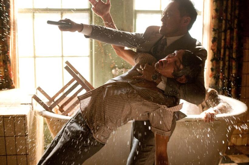 Lucas Haas as Nash and Ken Watanabe as Saito in "Inception."