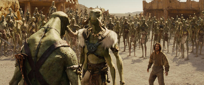 Willem Dafoe as Tars Tarkas and Taylor Kitsch as John Carter in "John Carter."