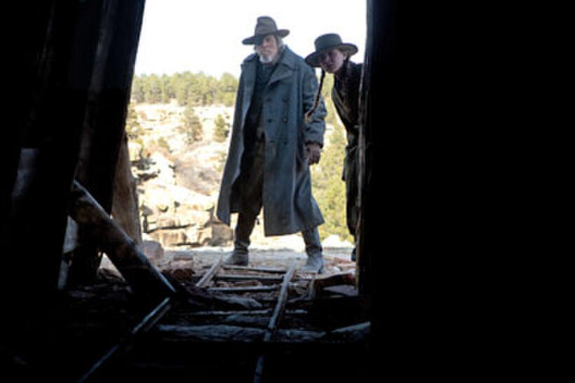 Jeff Bridges as Rooster Cogburn and Hailee Steinfield as Mattie Ross in "True Grit"