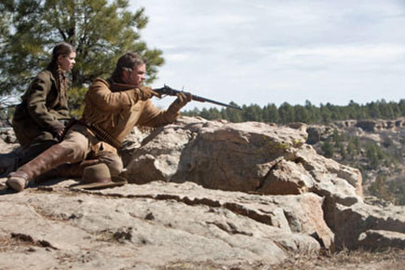 Hailee Steinfield as Mattie Ross and Matt Damon as La Boeuf in "True Grit"