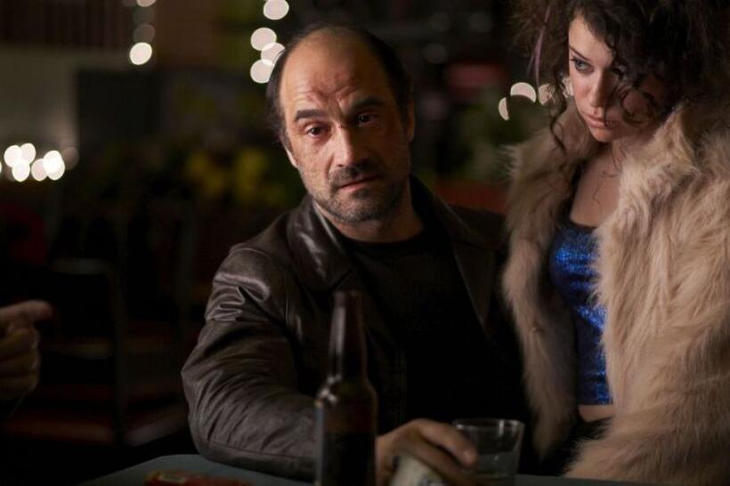 Elias Koteas as Chuck Dooney and Tatiana Maslany as Olga in "Defendor."