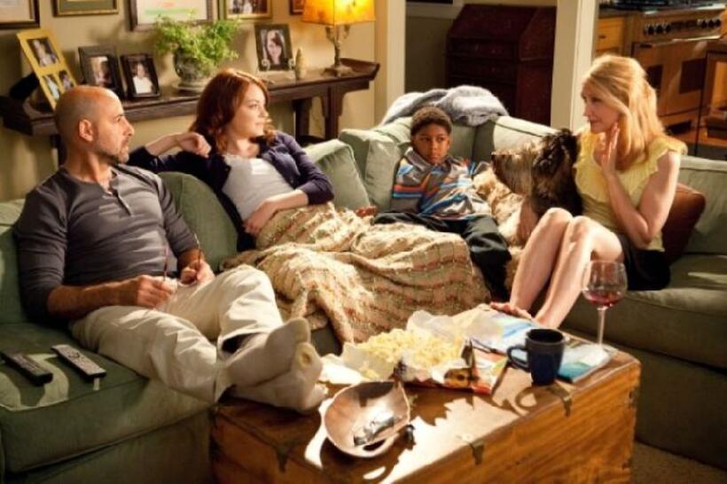 Stanley Tucci as Olive's father Dill, Emma Stone as Olive, Bryce Clyde Jenkins as Chip and Patricia Clarkson as Rosemary in "Easy A."