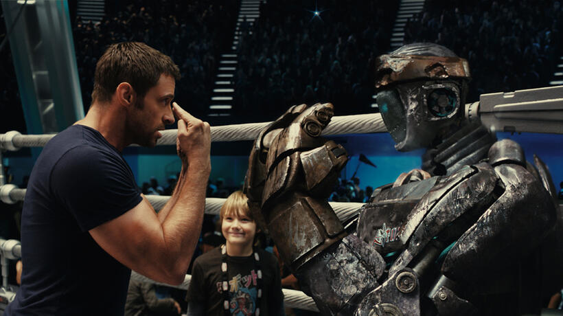 Hugh Jackman as Charlie Kenton, Dakota Goyo as Max and Atom in "Real Steel."