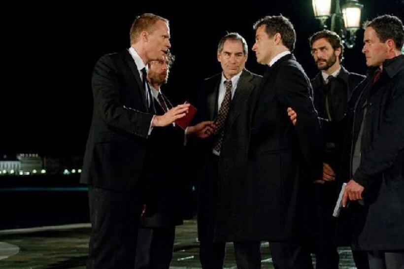 Paul Bettany as Agent Acheson, Timothy Dalton as Jones, Rufus Sewell as The Englishman, Alessio Boni and Giovanni Guidelli as Interpol Agents in "The Tourist."
