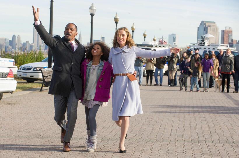 Jamie Foxx as Stacks, Quvenzhane Wallis as Annie and Rose Byrne as Grace in "Annie."