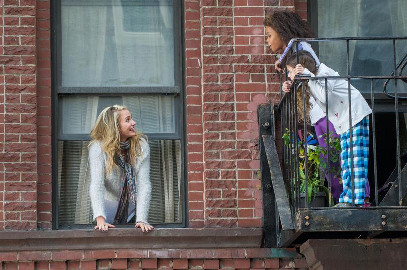 Cameron Diaz as Miss Hannigan, Quvenzhane Wallis as Annie and Nicolette Pierini as Mia in "Annie."
