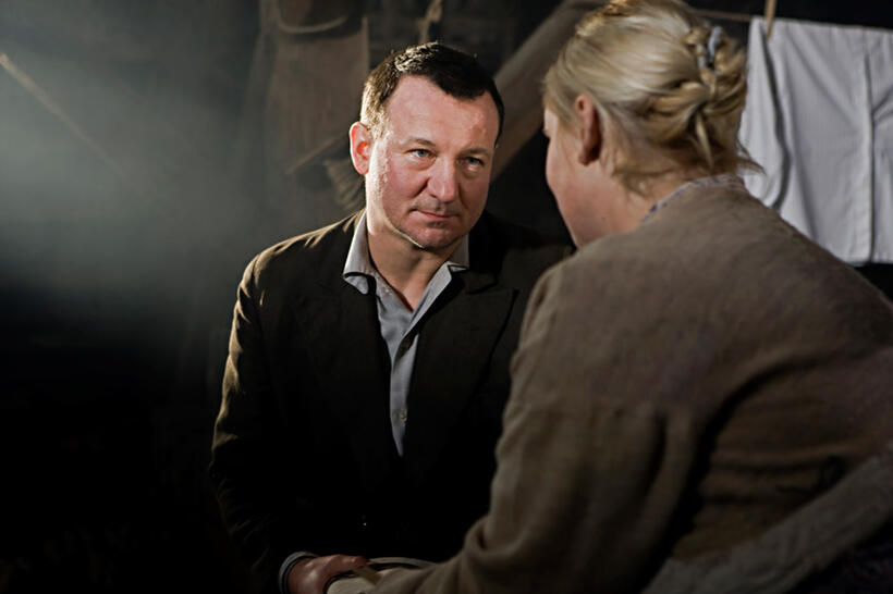 Robert Wieckiewicz as Leopold Socha and Kinga Preis as Wanda Socha in "In Darkness."