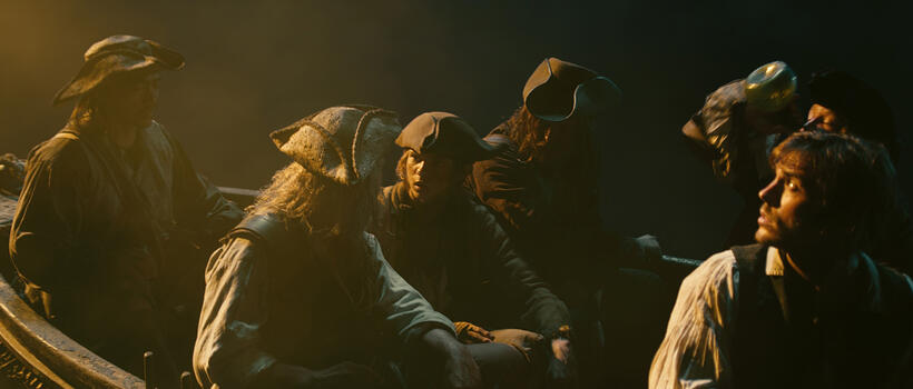 Stephen Graham as Scrum, Robbie Kay as Cabin Boy and Sam Claflin as Philip Swift in "Pirates Of The Caribbean: On Stranger Tides."