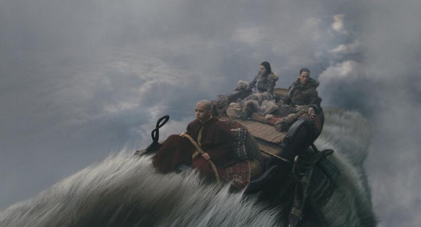 Noah Ringer as Aang, Nicola Peltz as Katara, Jackson Rathbone as Sokka and Appa in "The Last Airbender."