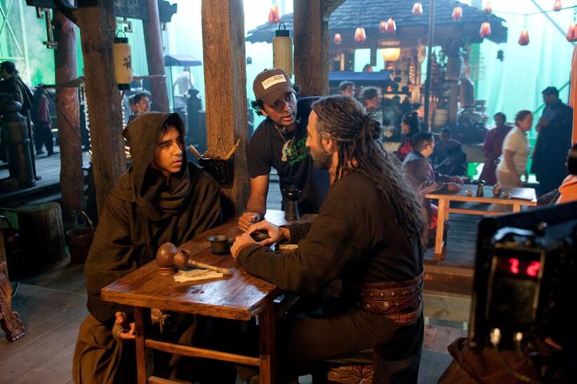 Writer/producer/director M. Night Shyamalan, Dev Patel and Shaun Toub on the set of "The Last Airbender."