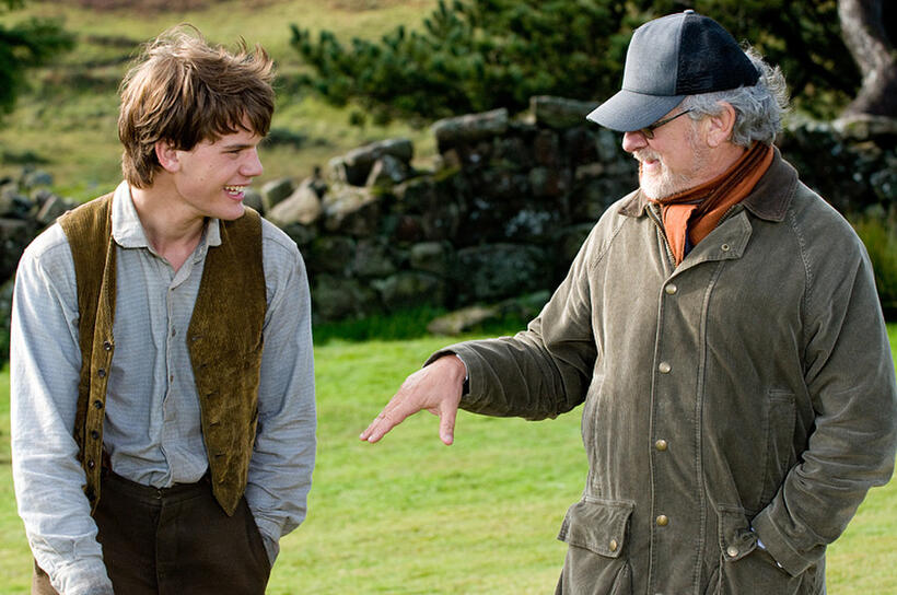Jeremy Irvine and director Steven Spielberg on the set of "War Horse."