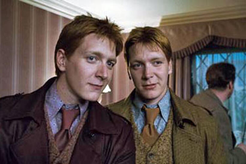 James and Oliver Phelps in "Harry Potter and the Deathly Hallows: Part 1"Rupert Grint, Daniel Radcliffe, Emma Watson and Andy Linden with house elves Kreacher and Dobby in "Harry Potter and the Deathly Hallows: Part 1"