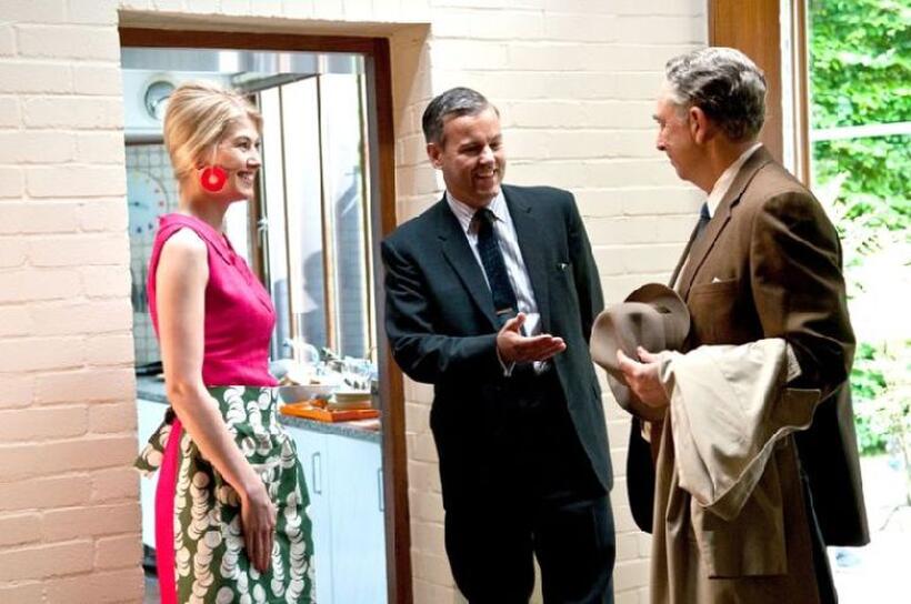 Rosamund Pike as Lisa Hopkins, Rupert Graves as Hopkins and Richard Schiff as Robert Tooley in "Made in Dagenham."