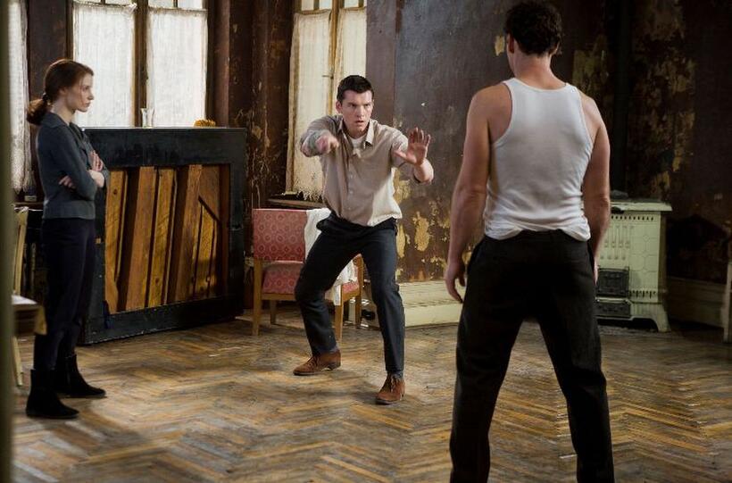 Jessica Chastain, Sam Worthington and Marton Csokas in "The Debt."
