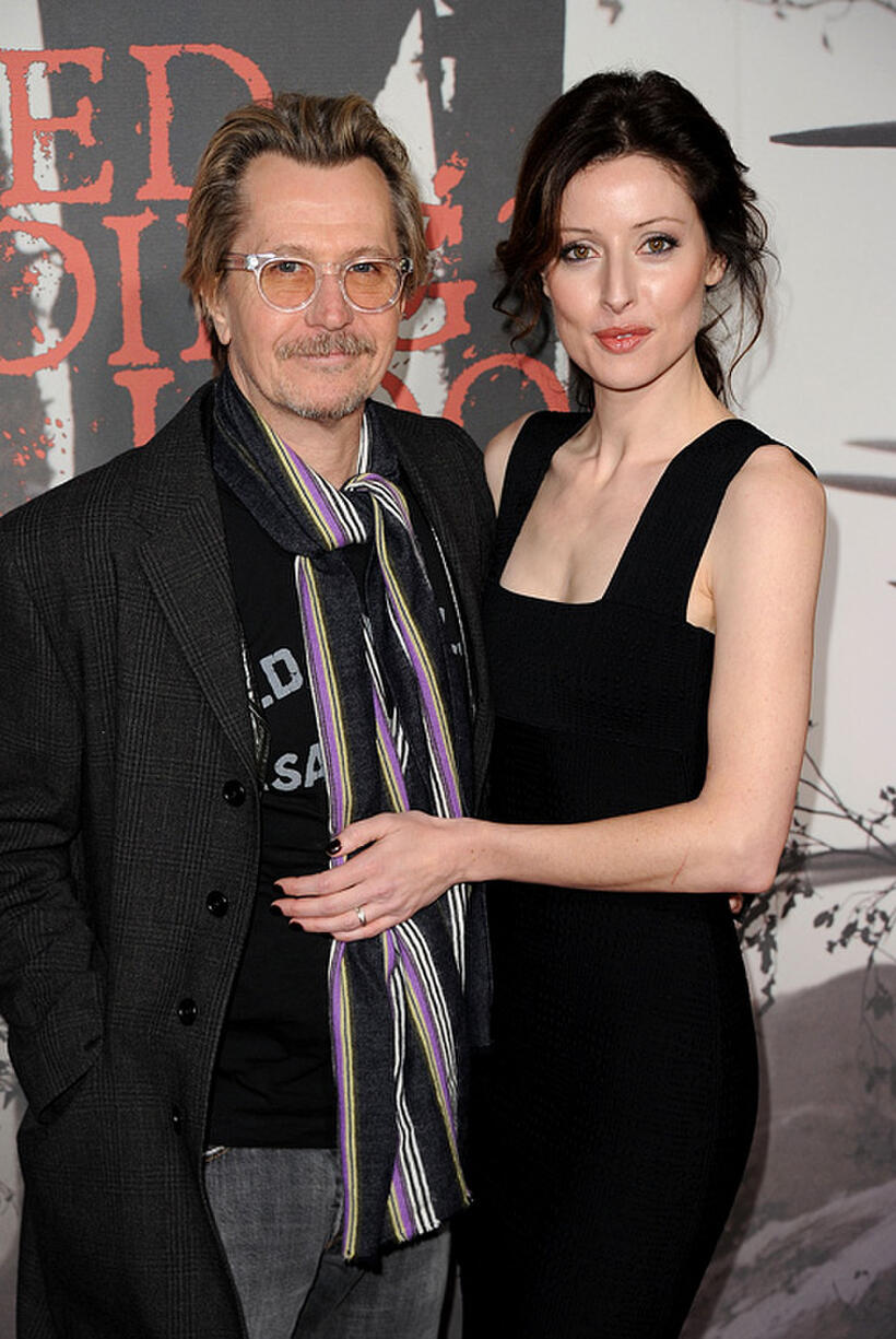 Gary Oldman and Donya Fiorentino at the California premiere of "Red Riding Hood.''