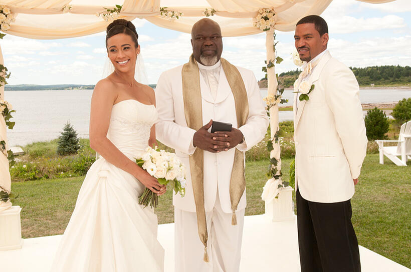 Paula Patton as Sabrina, TD Jakes as Reverend James and Laz Alonso as Jason in "Jumping the Broom."