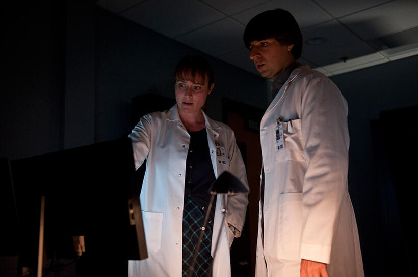 Jennifer Ehle as Dr. Ally Hextall and Demetri Martin as Dr. David Eisenberg in "Contagion."