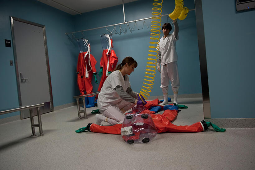 Jennifer Ehle as Dr. Ally Hextall and Demetri Martin as Dr. David Eisenberg in "Contagion."