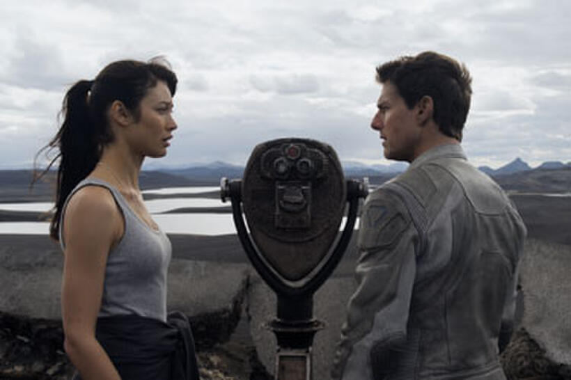 Olga Kurylenko and Tom Cruise in "Oblivion."