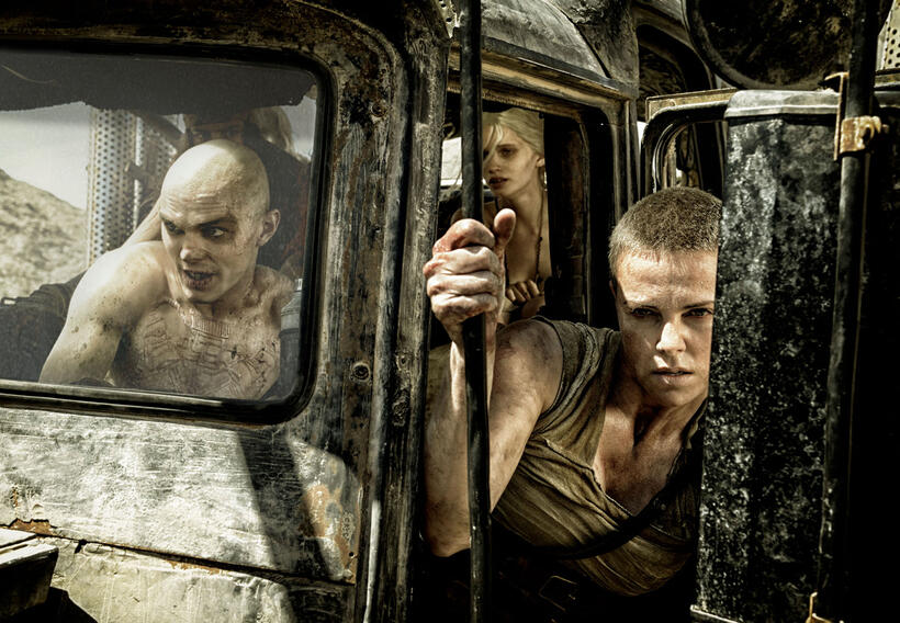 Nicholas Hoult as Nux, Abbey Lee Kershaw as Wag and Charlize Theron as Furiosa in "Mad Max: Fury Road."