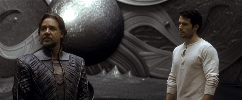 Russell Crowe as Jor-El and Henry Cavill as Clark Kent in "Man of Steel."