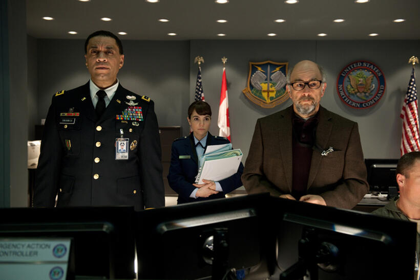 Harry J. Lennix as General Swanick, Christina Wren as Major Carrie Farris and Richard Schiff as Dr. Emil Hamilton in "Man of Steel."