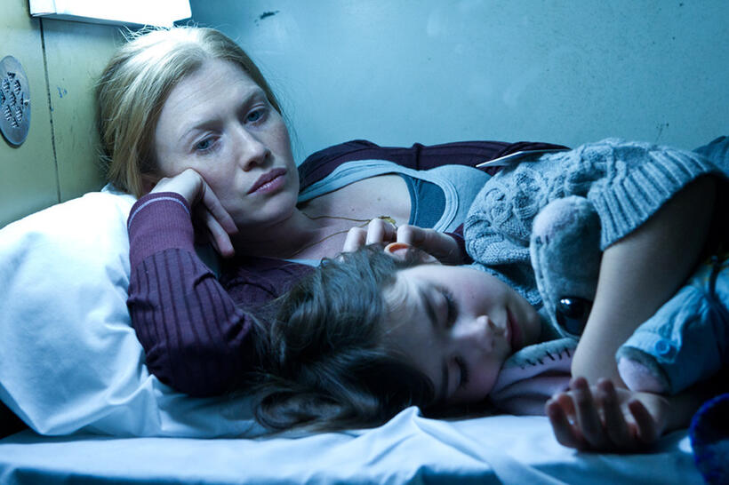 Mireille Enos as Karin Lane and Sterling Jerins as Constance Lane in "World War Z."