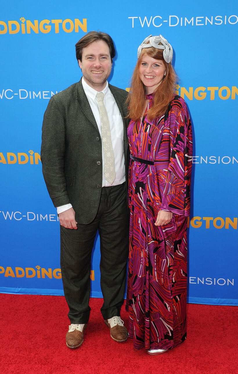 Paul King and guest at the California premiere of "Paddington."