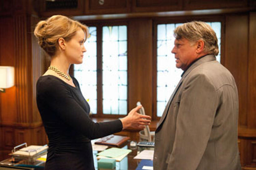 Taylor Schilling as Dagny Taggart and Graham Beckel as Ellis in "Atlas Shrugged."