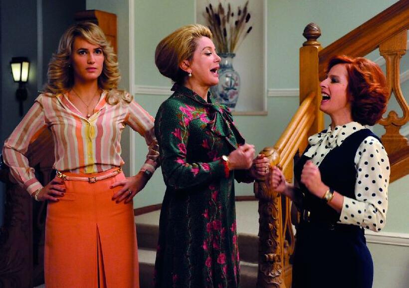 Judith Godreche as Joelle, Catherine Deneuve as Suzanne Pujol and Karin Viard as Nadege in "Potiche."