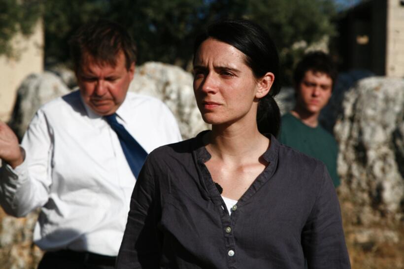 Remy Girard as Notary Jean Lebel, Melissa Desormeaux-Poulin as Jeanne Marwan and Maxim Gaudette as Simon Marwan in "Incendies."