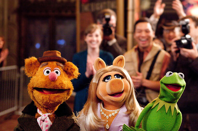 Fozzie Bear, Miss Piggy and Kermit The Frog in "The Muppets."