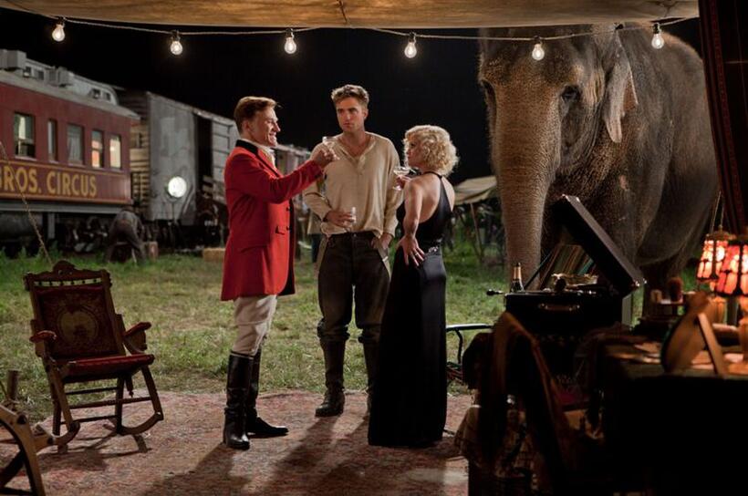 Christoph Waltz as August, Robert Pattinson as Jacob, Reese Witherspoon as Marlena and Rosie the elephant in "Water for Elephants."