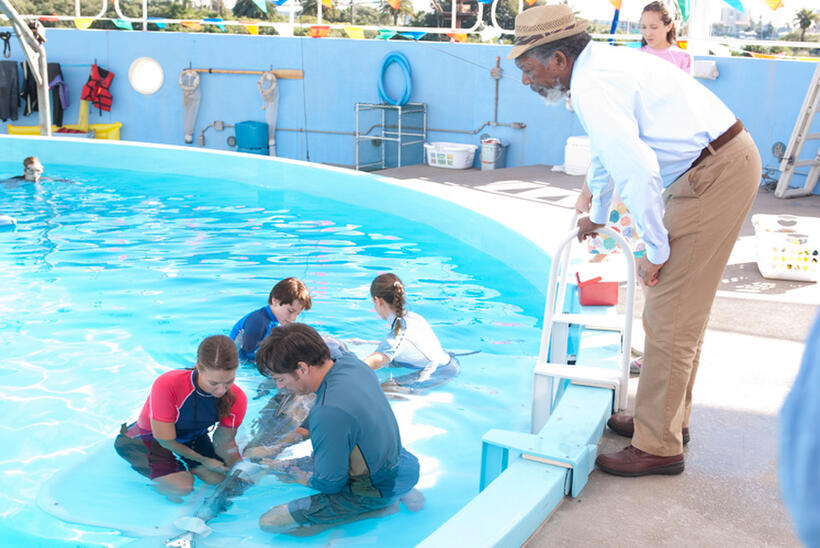Austin Highsmith as Phoebe, Nathan Gamble as Sawyer Nelson, Harry Connick, Jr. as Dr. Clay Haskett, Betsy Landin as Kat and Morgan Freeman as Dr. Cameron Mccarthy in "Dolphin Tale."